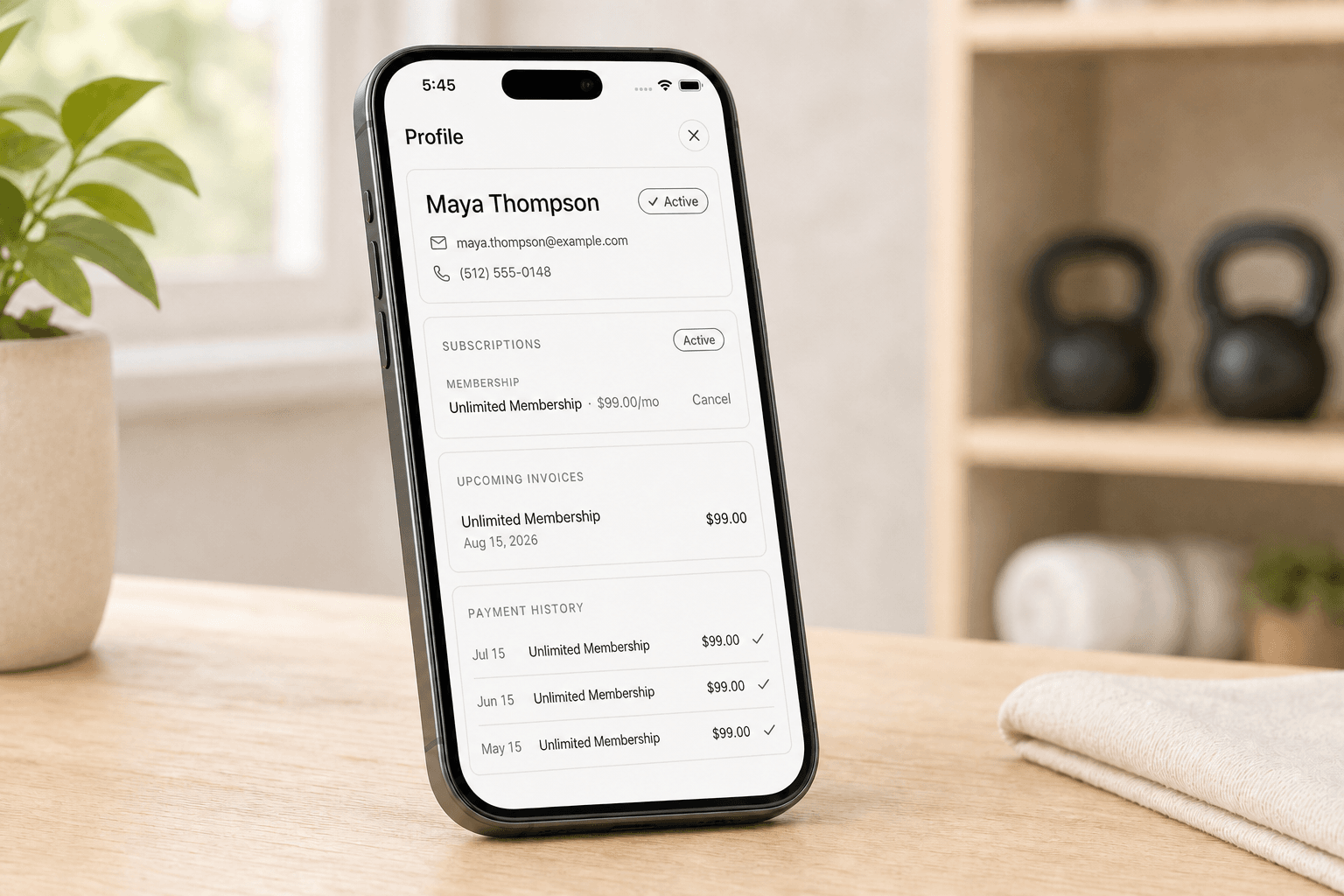 A member profile in Gymsense showing an active membership, upcoming invoice and payment history